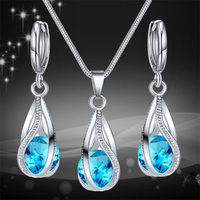 Ensemble collier et boucles d'oreilles avec pendentif mélodie chic, bijoux scintillants en cristal pour femmes 1